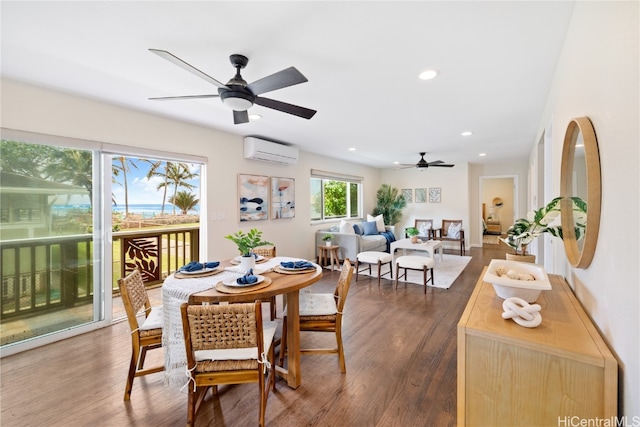 dining space with ceiling fan, dark hardwood / wood-style floors, and a wall unit AC