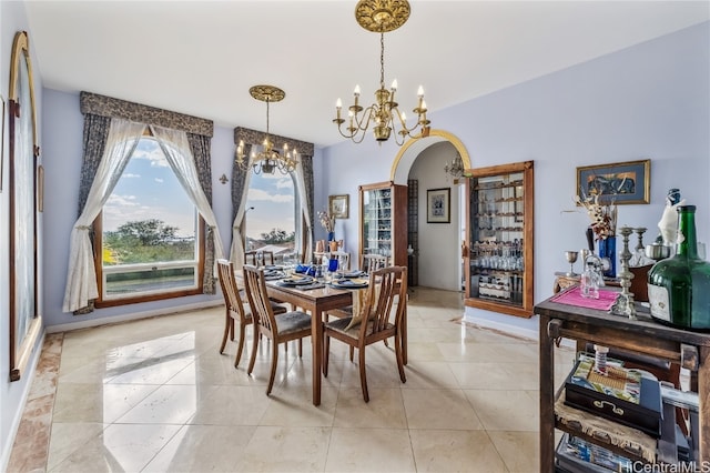 dining area with light tile patterned flooring