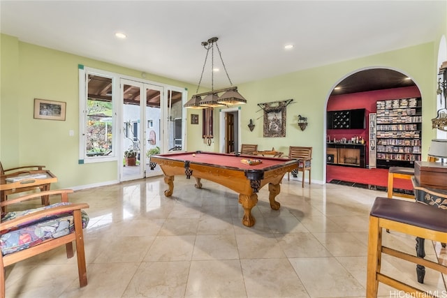 rec room featuring light tile patterned flooring, french doors, and billiards