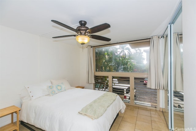 bedroom featuring ceiling fan and light tile patterned floors