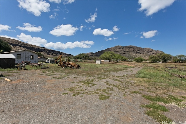 view of mountain feature featuring a rural view