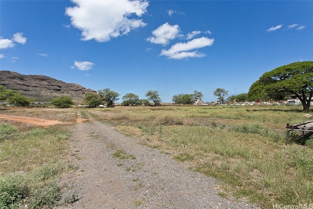 view of road featuring a mountain view and a rural view