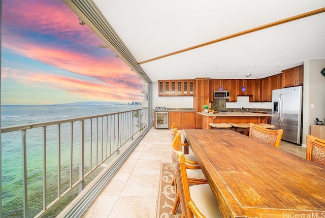 balcony at dusk with a water view