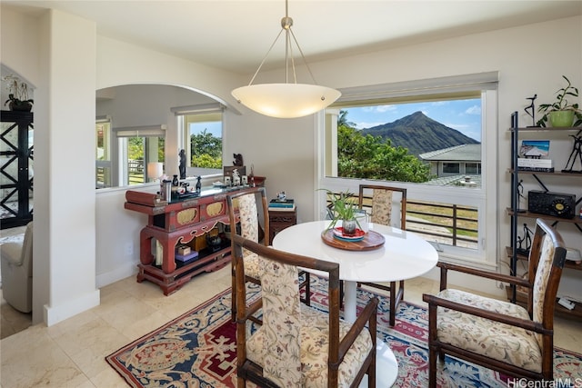 dining space featuring a mountain view