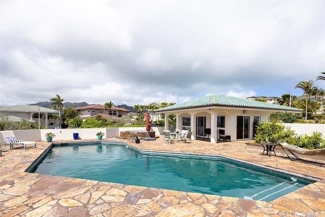 view of pool featuring a patio