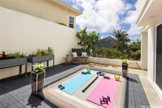 view of patio featuring a mountain view