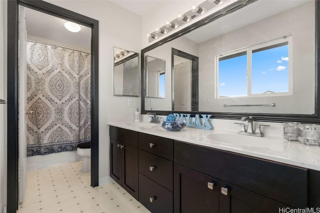 full bathroom with toilet, vanity, and shower / tub combo