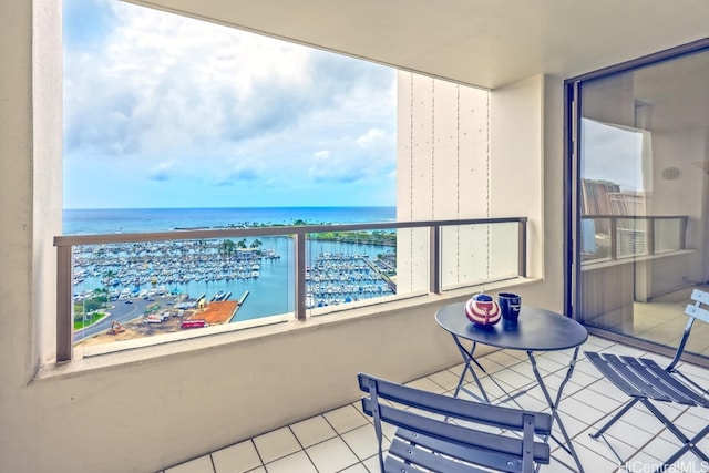 balcony featuring a water view