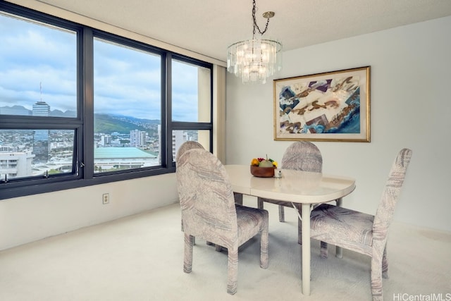 dining room with a notable chandelier