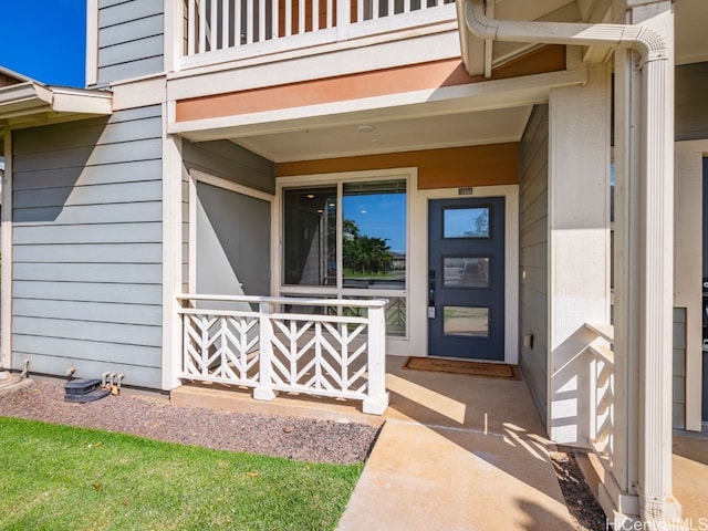 doorway to property featuring a balcony