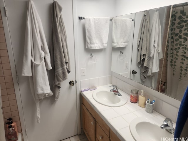 bathroom featuring vanity and a shower with curtain