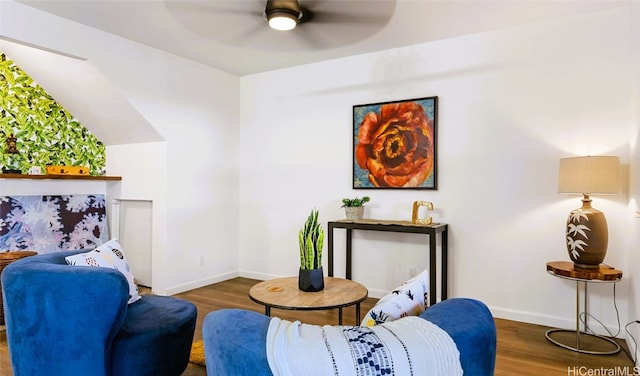 sitting room featuring ceiling fan and dark hardwood / wood-style flooring