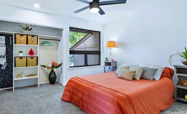 carpeted bedroom with ceiling fan