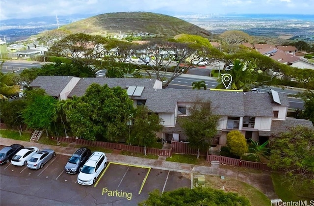 drone / aerial view featuring a mountain view