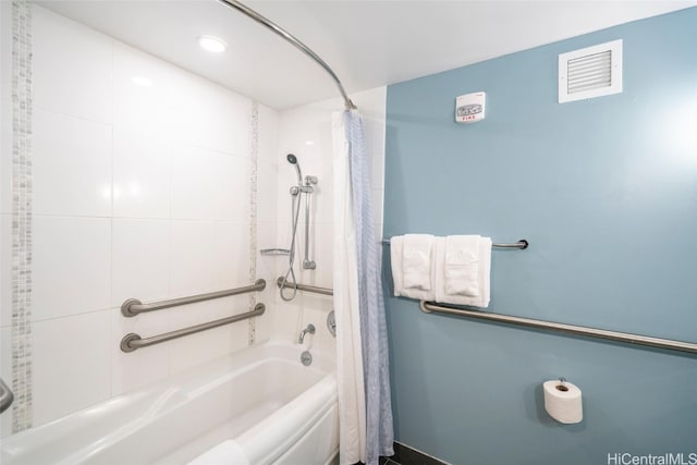 bathroom with shower / bath combo