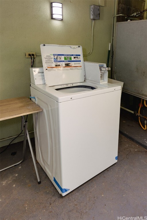 washroom featuring washing machine and dryer