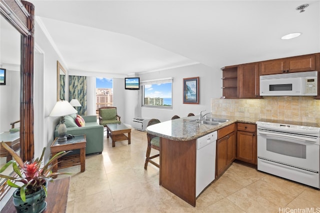 kitchen featuring kitchen peninsula, decorative backsplash, light tile patterned floors, sink, and white appliances