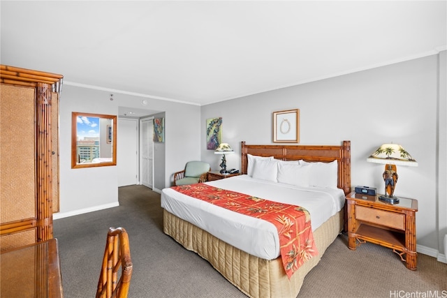 carpeted bedroom featuring crown molding