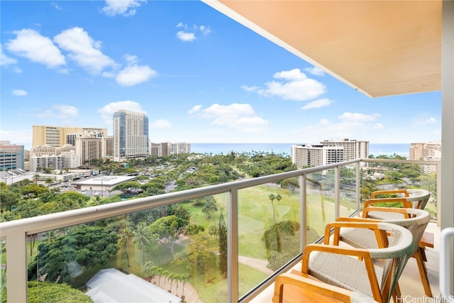 balcony featuring a water view