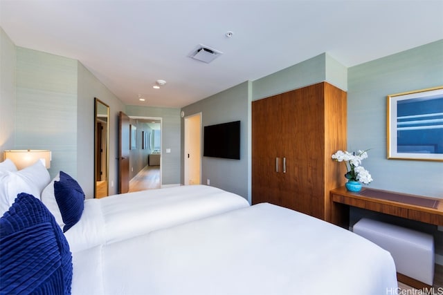 bedroom featuring hardwood / wood-style flooring