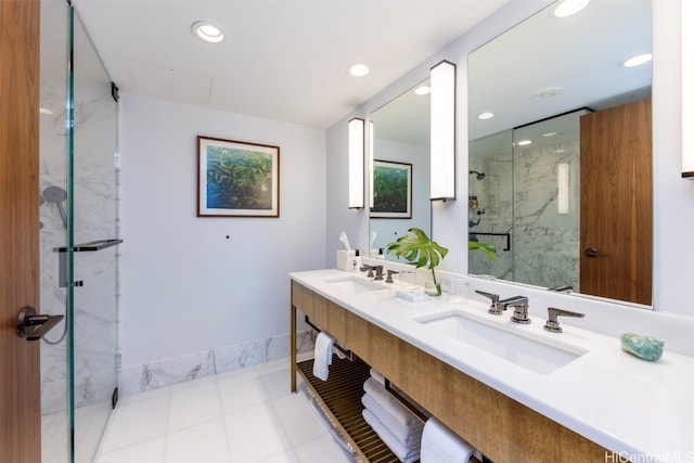 bathroom with vanity and a shower with shower door