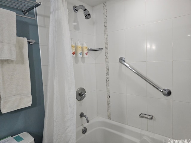 bathroom with shower / bathtub combination with curtain