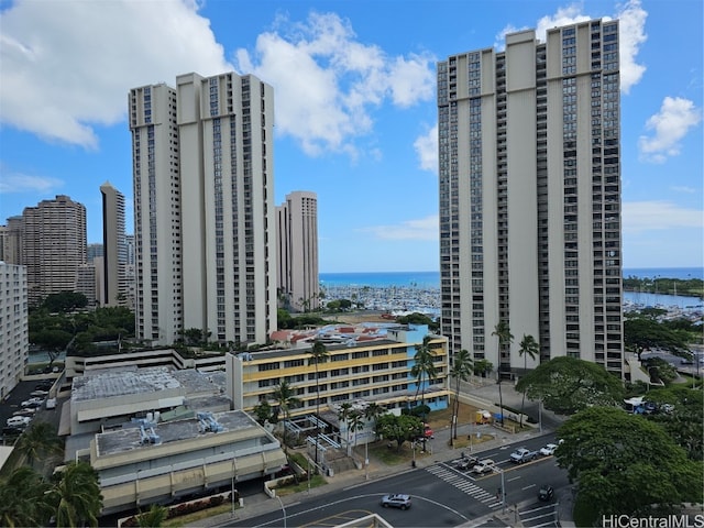 property's view of city featuring a water view