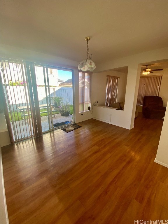 interior space featuring hardwood / wood-style floors and ceiling fan