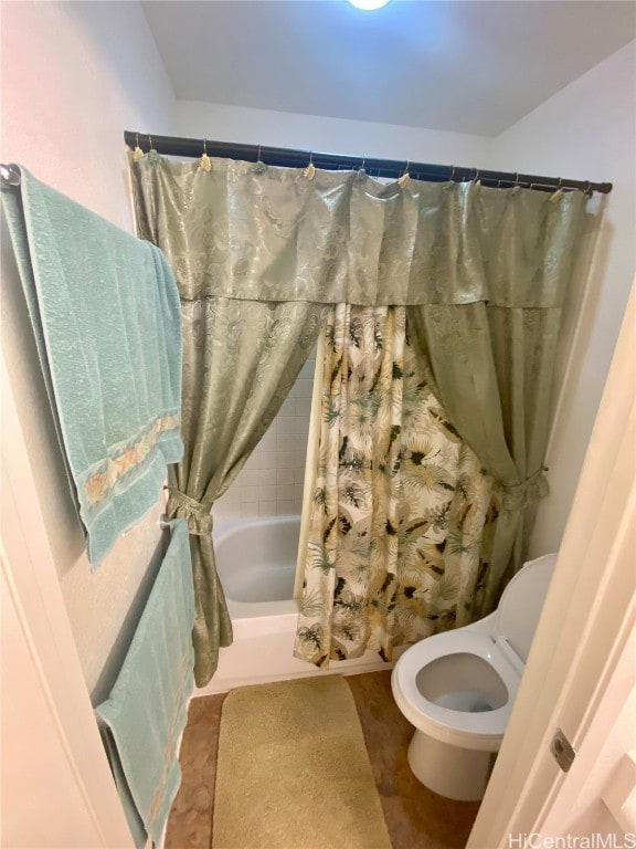 bathroom with toilet, tile patterned floors, and shower / bathtub combination with curtain