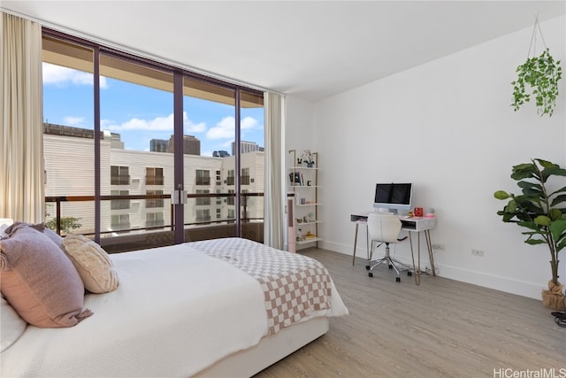 bedroom featuring hardwood / wood-style floors