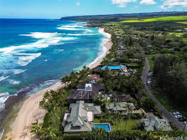 aerial view featuring a water view and a view of the beach