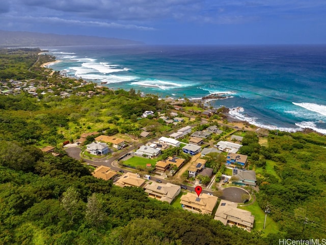 bird's eye view with a water view and a view of the beach