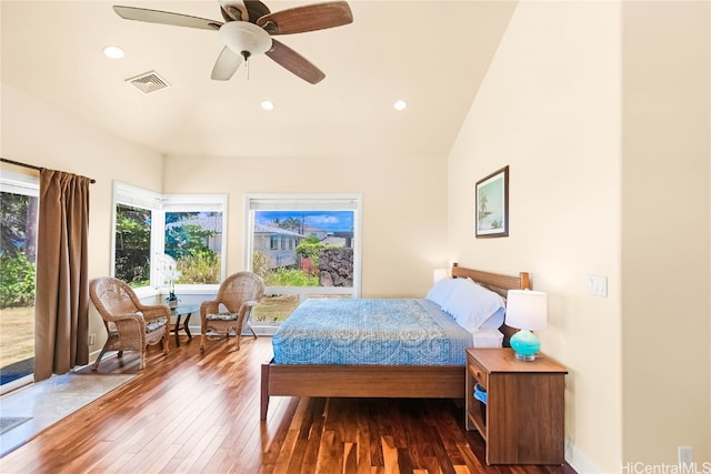 bedroom featuring dark wood-type flooring, ceiling fan, access to outside, and vaulted ceiling