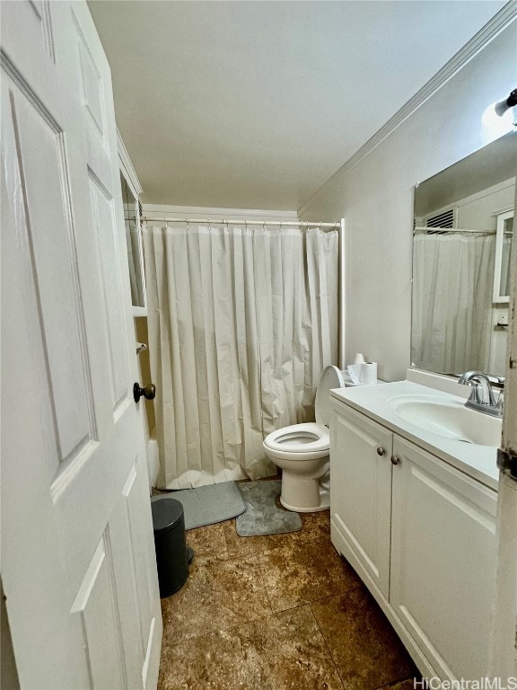 bathroom with vanity, toilet, and a shower with shower curtain