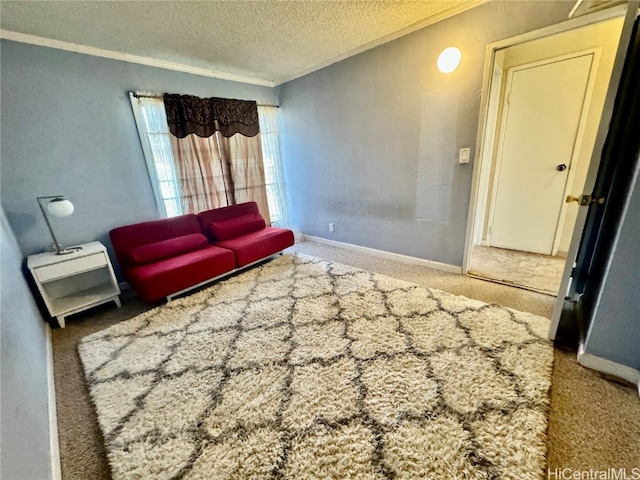 unfurnished living room with ornamental molding, a textured ceiling, and carpet flooring