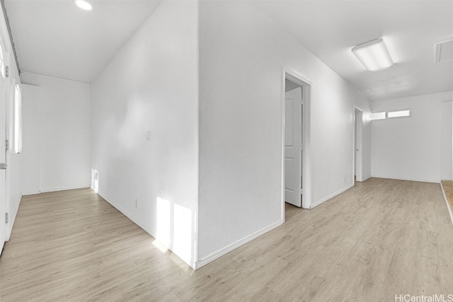 hallway featuring light wood-type flooring