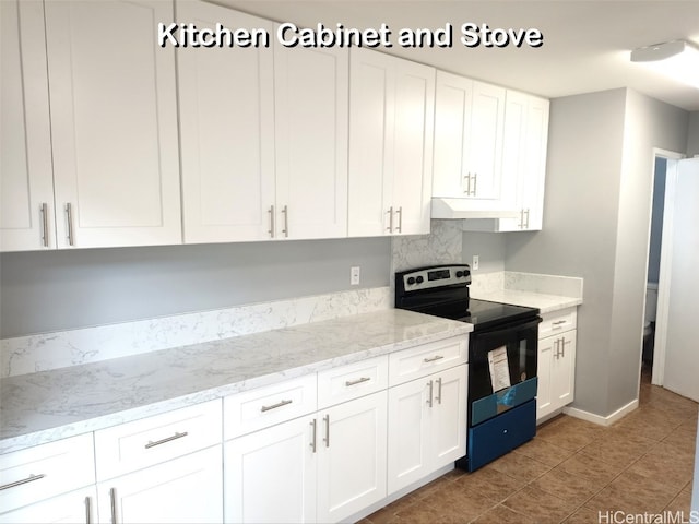 kitchen with white cabinetry, black range with electric stovetop, light tile patterned floors, and light stone countertops