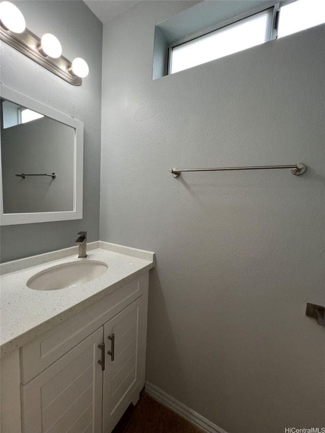 91-1021 Kuina St Unit 119, Ewa Beach, HI 96706 - bathroom featuring baseboards and vanity