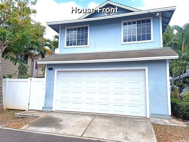 91-1021 Kuina St Unit 119, Ewa Beach, HI 96706 - garage featuring concrete driveway and fence