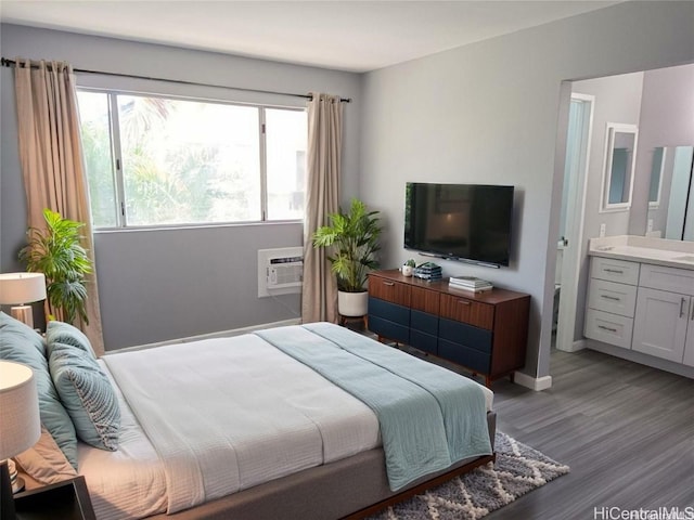 91-1021 Kuina St Unit 119, Ewa Beach, HI 96706 - bedroom with connected bathroom, baseboards, and light wood finished floors