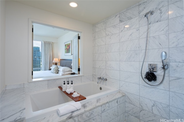 bathroom with separate shower and tub