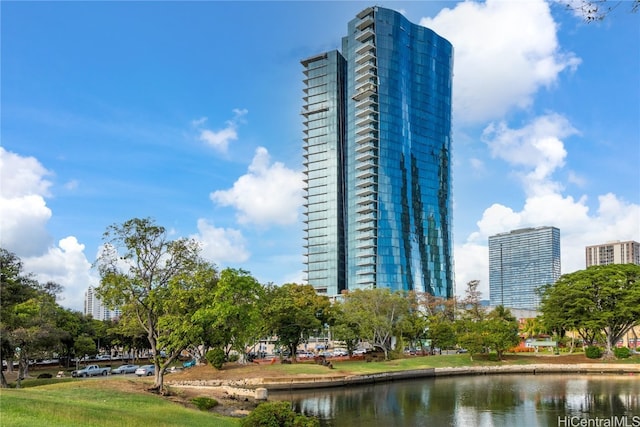 view of building exterior with a water view