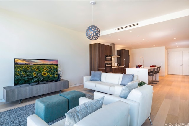 living room with light wood-type flooring