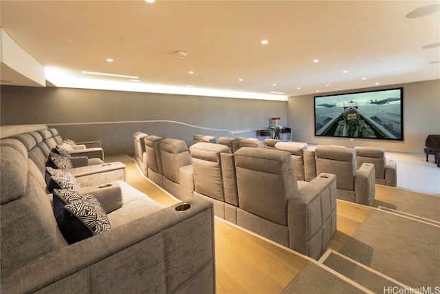 home theater with light hardwood / wood-style flooring