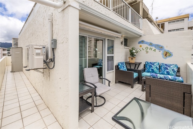 view of patio / terrace featuring a balcony, ac unit, and an outdoor hangout area