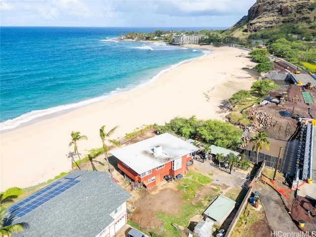 aerial view featuring a water view and a beach view