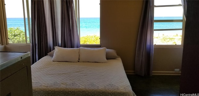 bedroom with a water view