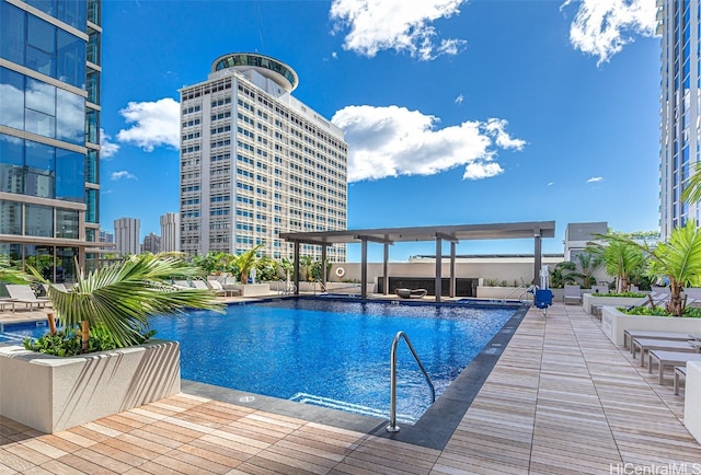 view of pool featuring a patio area