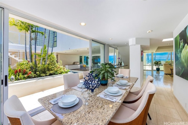 dining room featuring light tile patterned floors