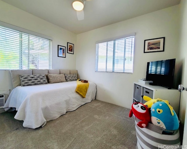 carpeted bedroom featuring ceiling fan